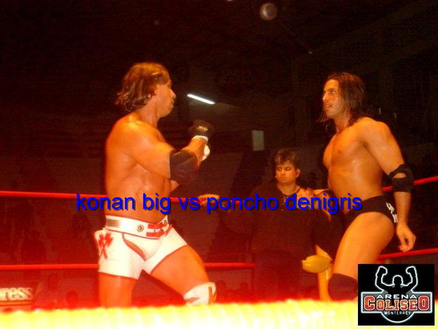 File:Konnan big vs poncho denigris.jpg