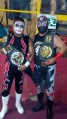 with Caballero Azteca Jr. as Costa del Pacífico Tag Team Champions